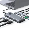 ノートPCに接続された8-in-1 USB-Cドッキングステーションと周辺機器