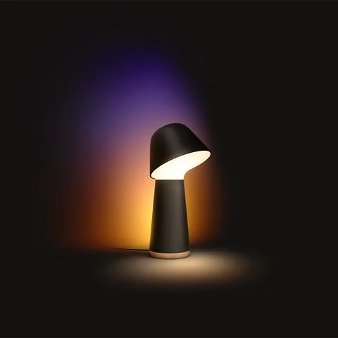 黒いPhilips Hueトワイライトベッドサイドライトが放つグラデーション光