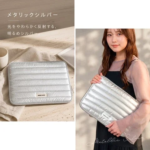メタリックシルバーのPCケースと持ち歩く女性