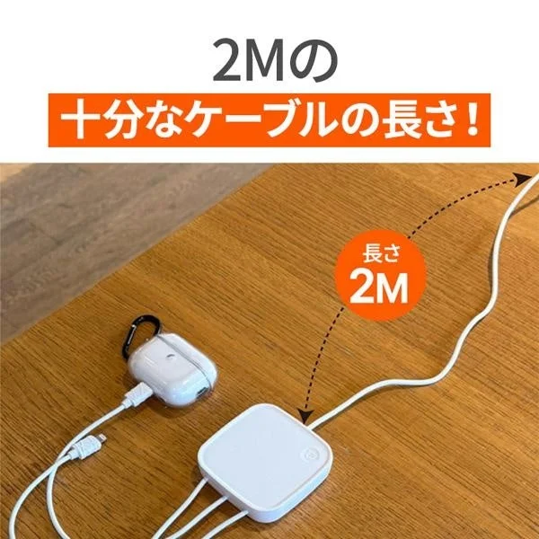 POP Phoneの本体と2mケーブル、イヤホンケースを木製テーブルに配置した写真
