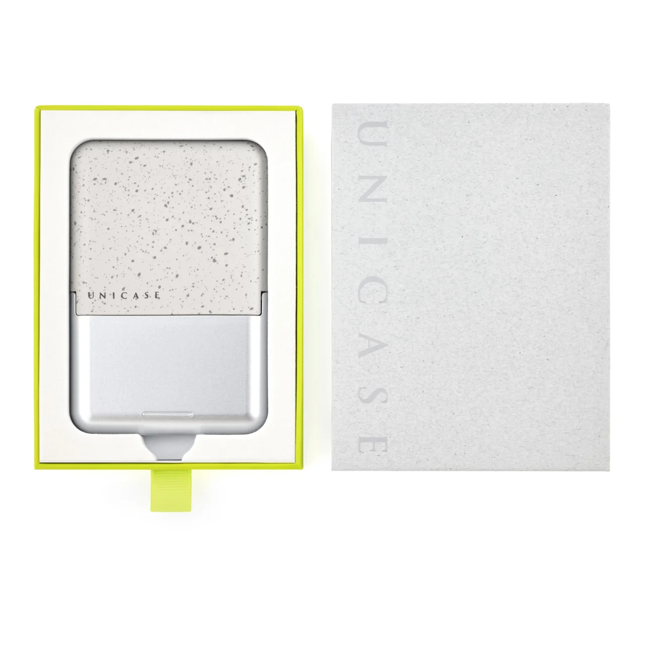 UNICASE STONE SERIESのパッケージ。ライムグリーンの枠とリボン型プルタブ、UNICASEロゴ入りの箱