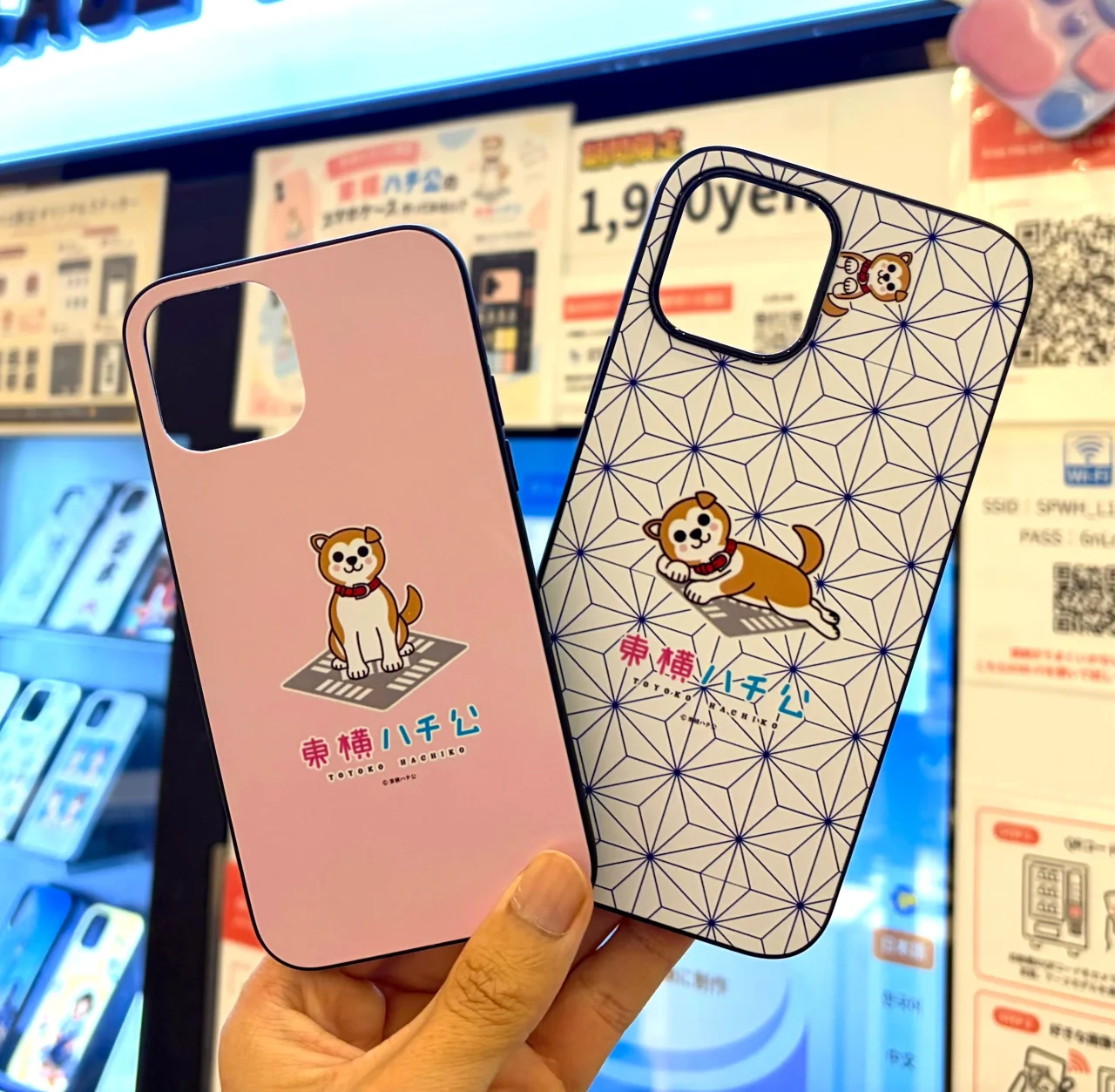 東急ハチ公ステッカーを印刷した、ピンクと和柄の2種のスマホケース
