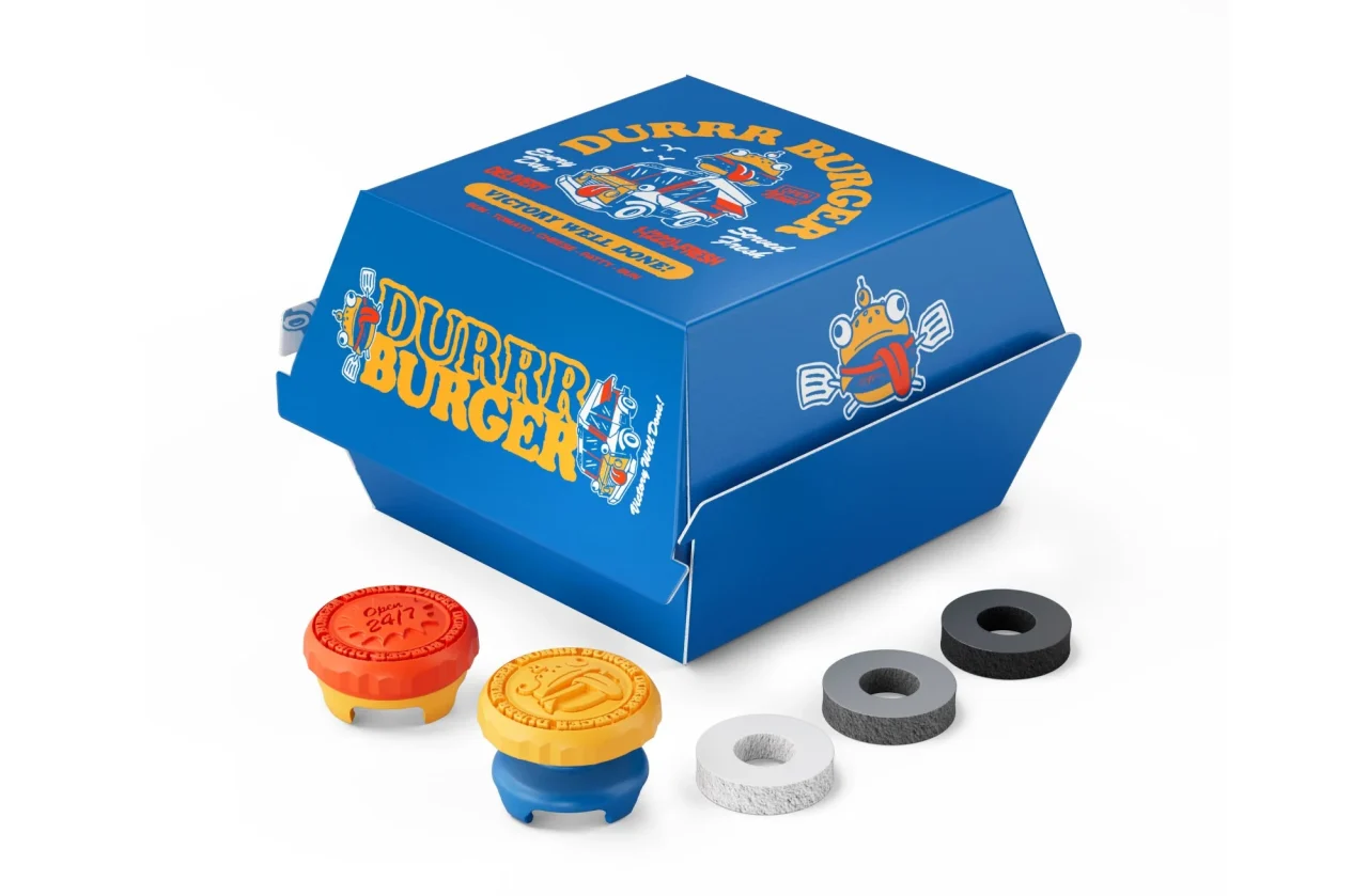 Fortnite Durrr Burger Collection。青いバーガー型パッケージとサムスティック、リング