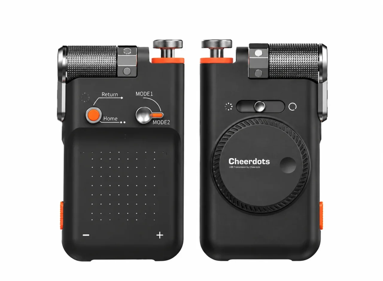 Cheerdotsロゴ入りの黒いデバイスの表面と背面。円形ダイヤルとオレンジ色のボタン