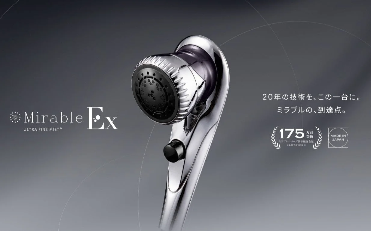 ミラブルExのシャワーヘッド。銀色の本体と手元止水ボタン