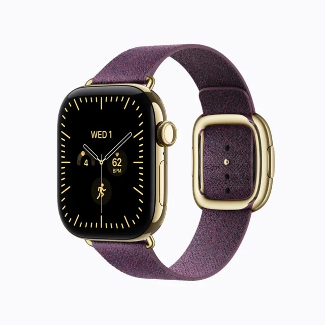 Apple Watch Series 12。ゴールドのケースと紫のモダンバックルバンド