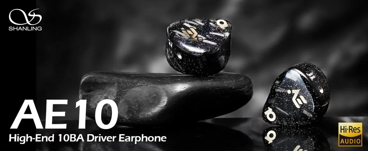 SHANLING AE10 10BAドライバーイヤホン、黒い石の上に置かれた2つのイヤホン