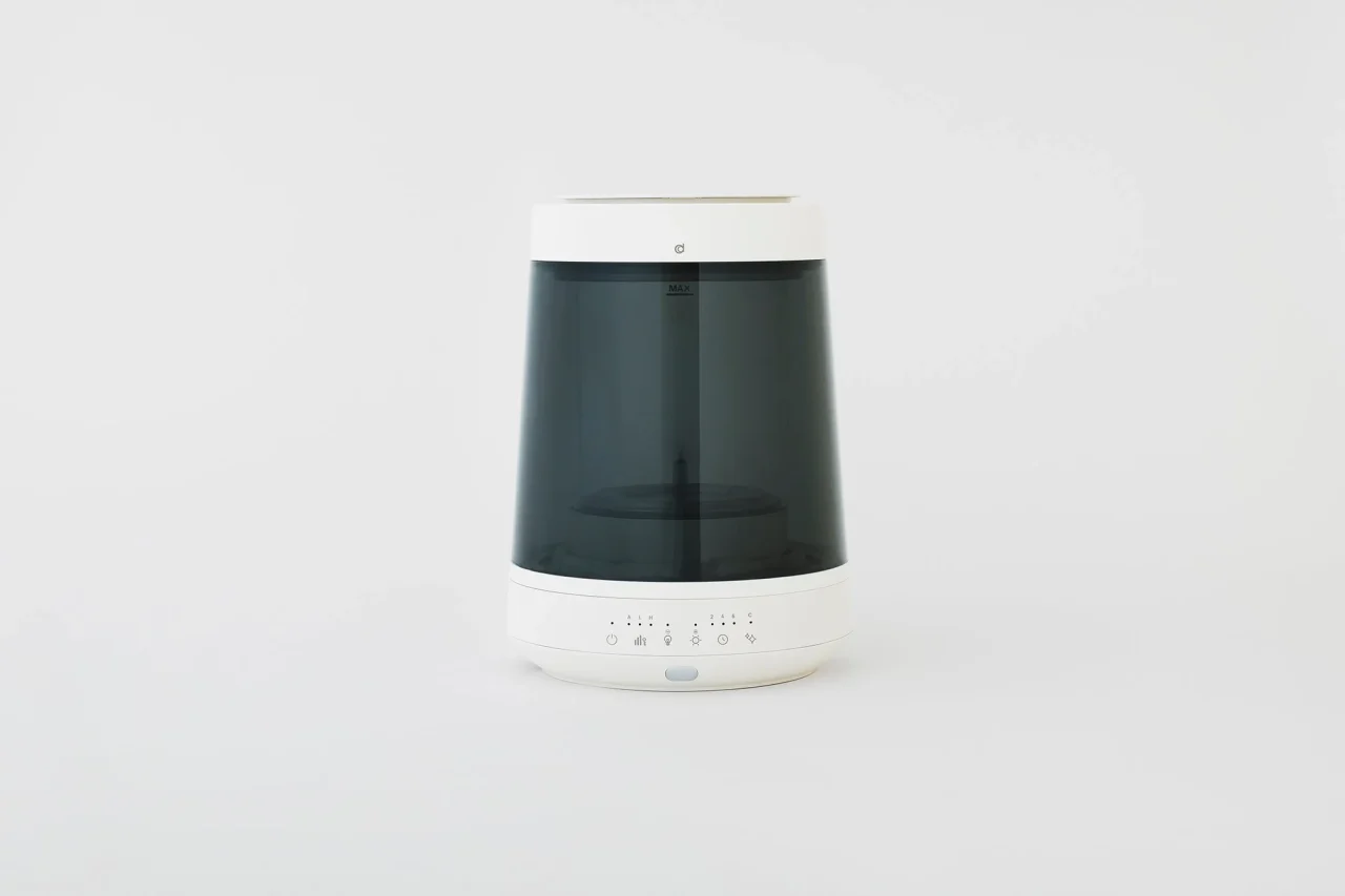 GLASS STEAM HUMIDIFIER 新色ダークグリーンの正面。白い台座とふた