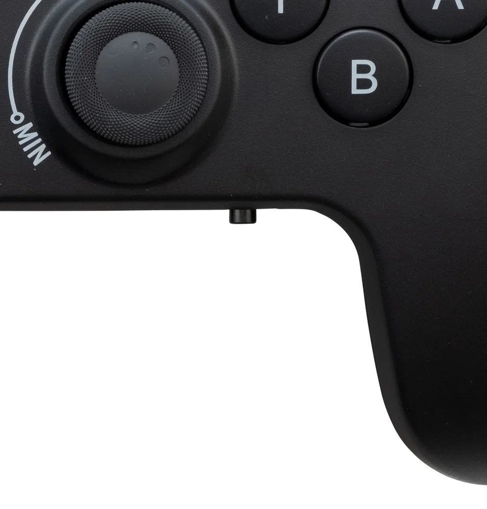 「ボタンロック機能」のスイッチ。コントローラー下部の小さなスイッチ