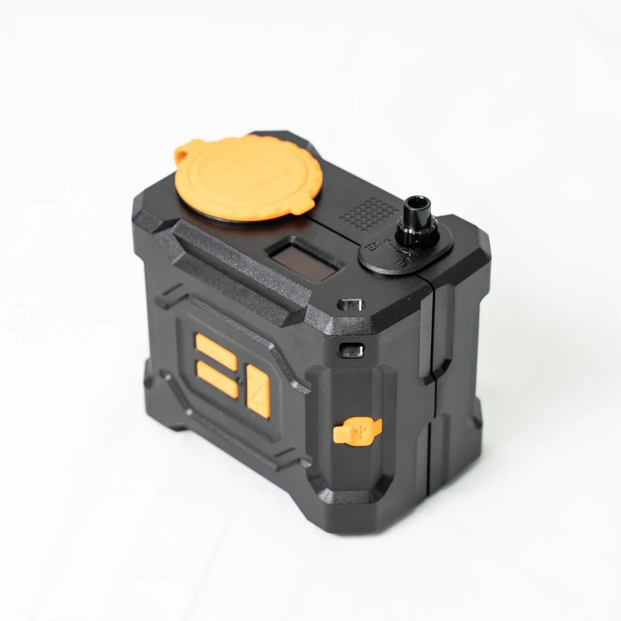 ACETECH MINI LOADERの本体。黒い筐体にオレンジのカバーとOLED画面