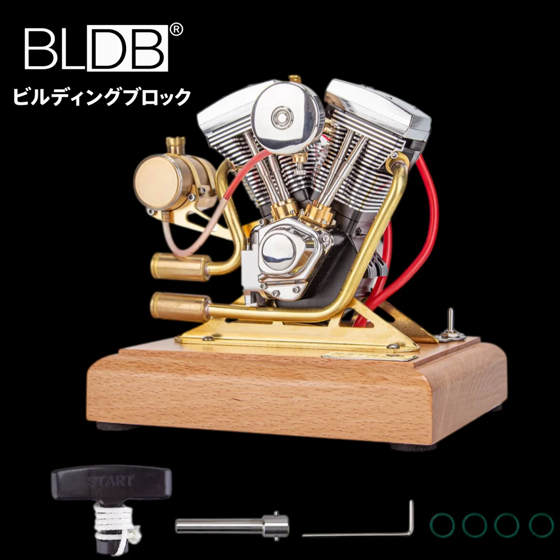 木製ベース上のRETROL R33 Vツインエンジン模型と始動用付属品
