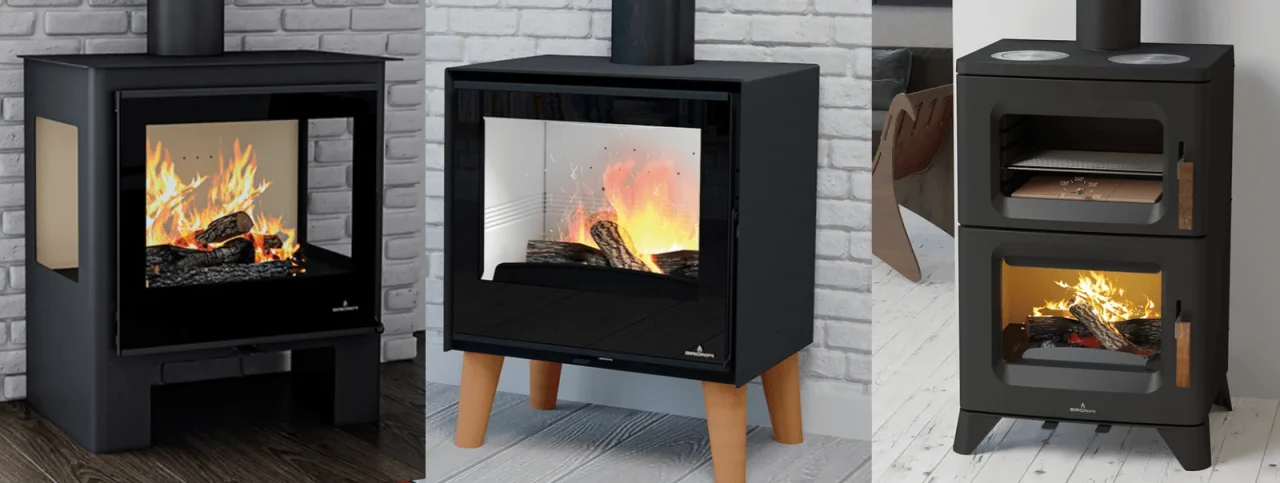 BRONPIの薪ストーブ3台。三面ガラス、木製脚、上部に天板とオーブンのモデル