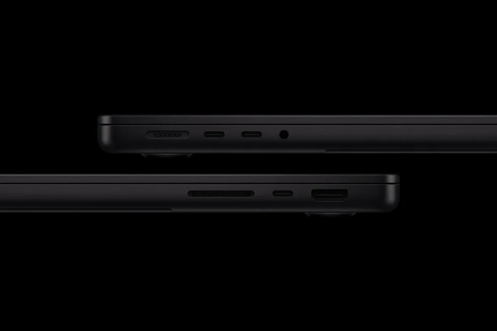14インチMacBook Proの側面にあるポート類を並べた黒背景の画像