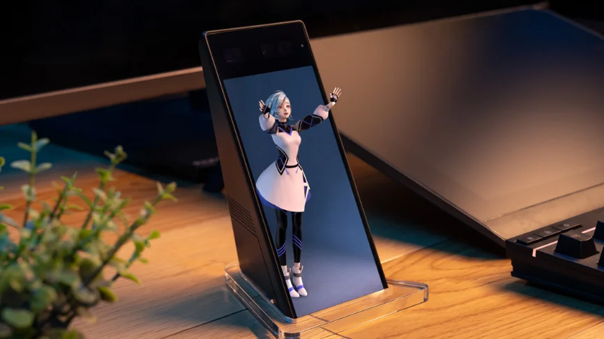 机上に置かれた空間再現ディスプレイ『ELF-MN1』にキャラクターが立体表示