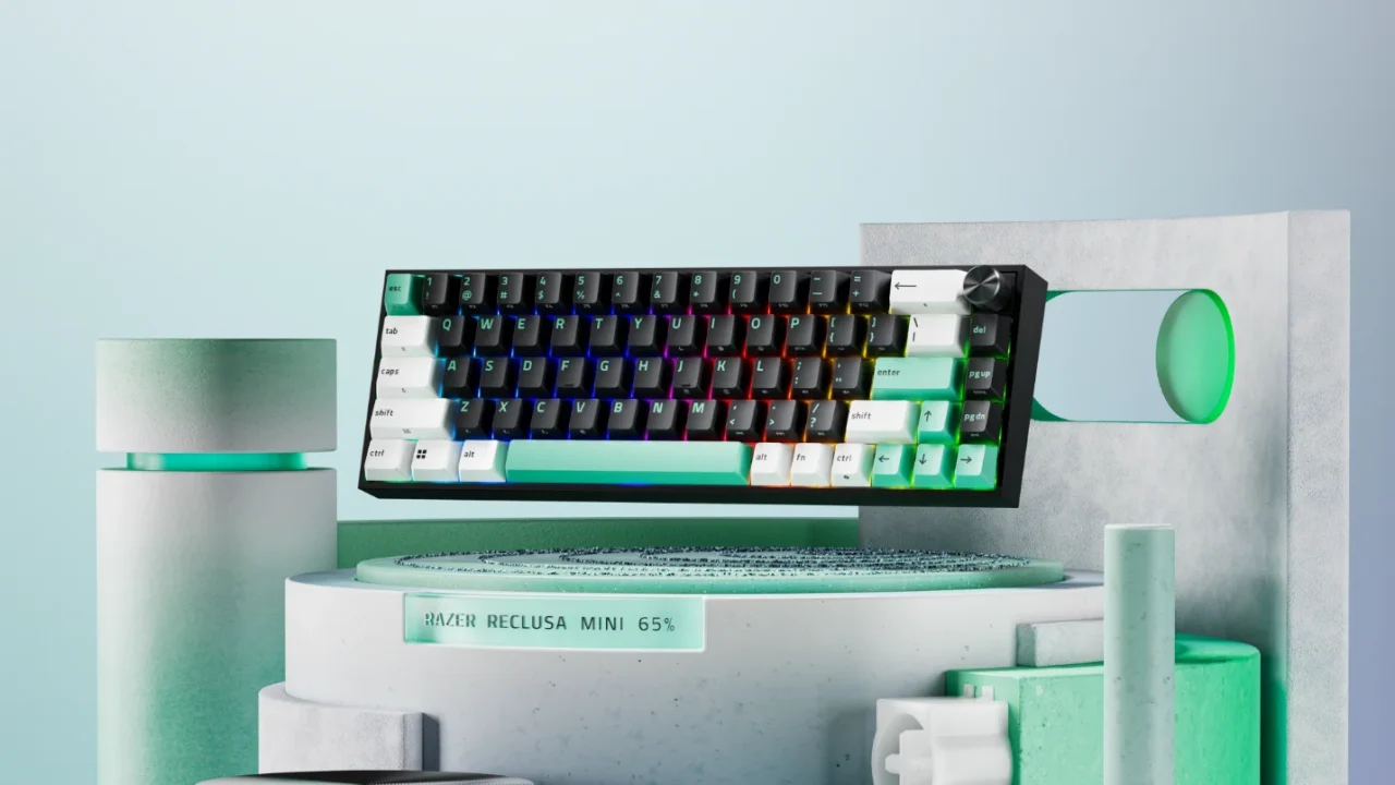 台座の上に浮かぶRazer Reclusa Mini 65%の白黒ミント配色キーボード